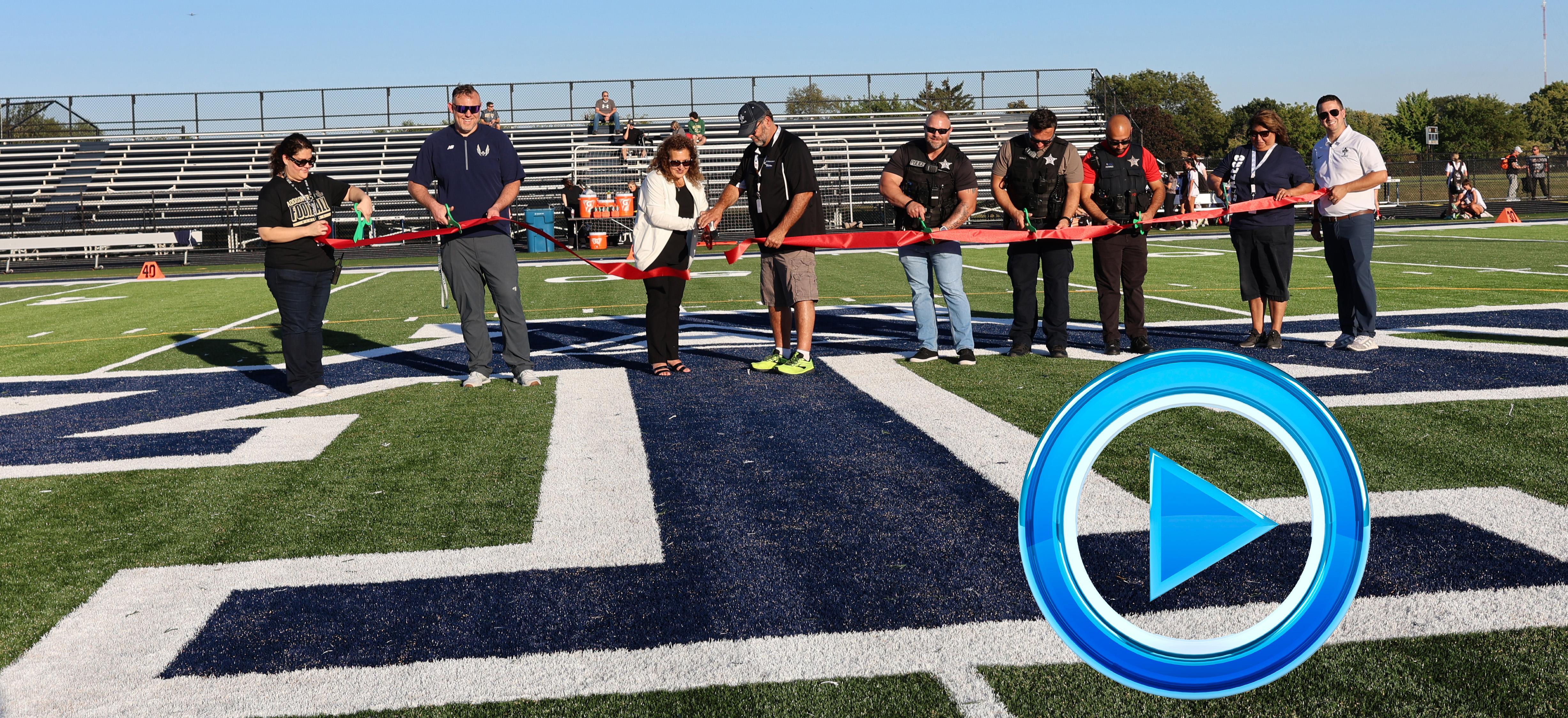 Addison Trail hosts ribbon cutting to celebrate official grand opening of updated turf stadium field